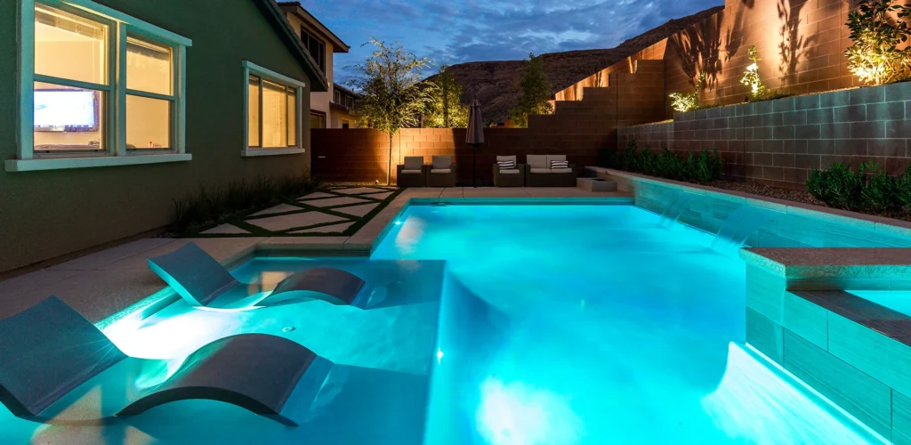 Gallery - Watters Aquatech Pools & Spas Evening shot of a swimming pool - Watters Aquatech